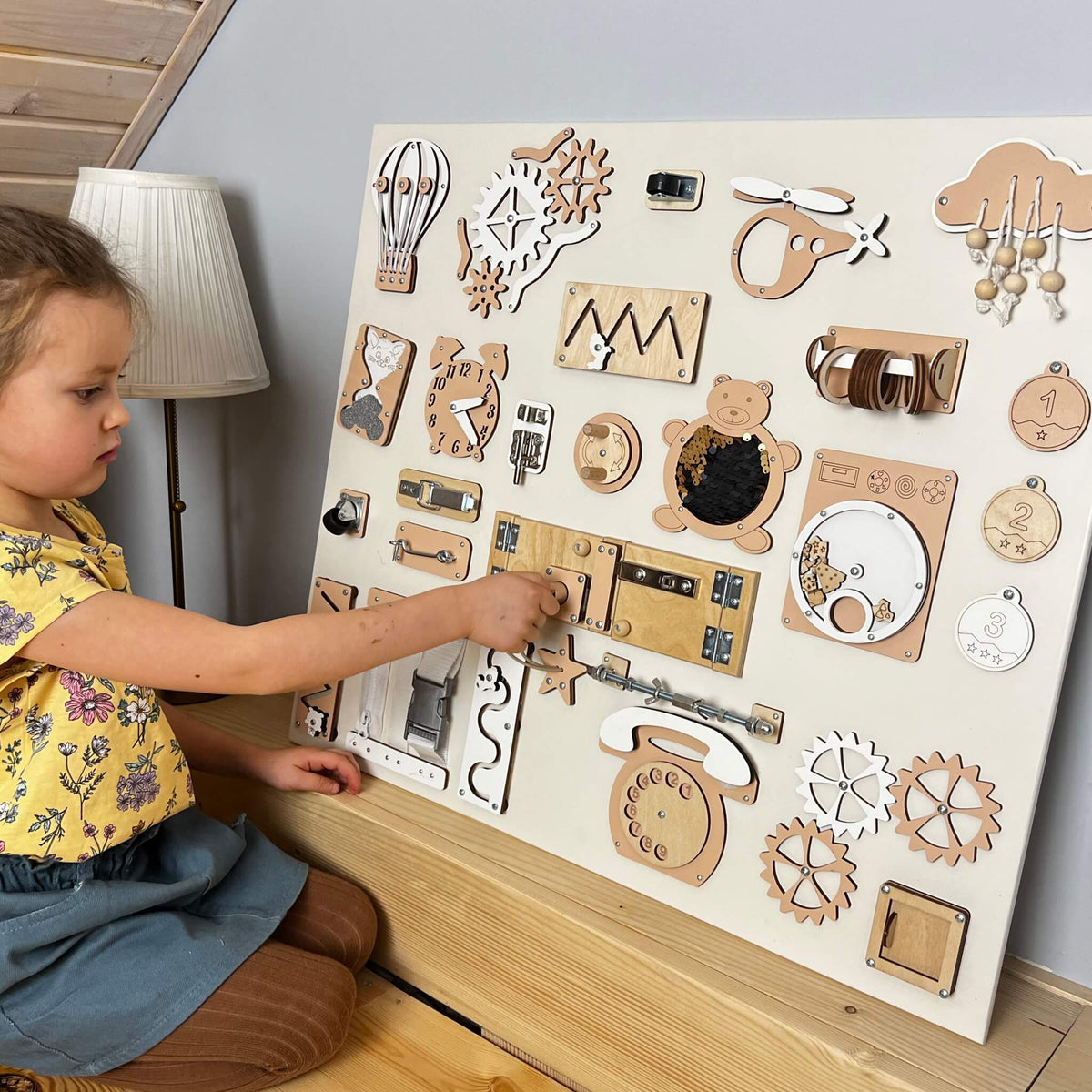 Wooden Busy Board for Toddlers with a Steering Wheel Wooden Busy Board for Toddlers with a Steering Wheel